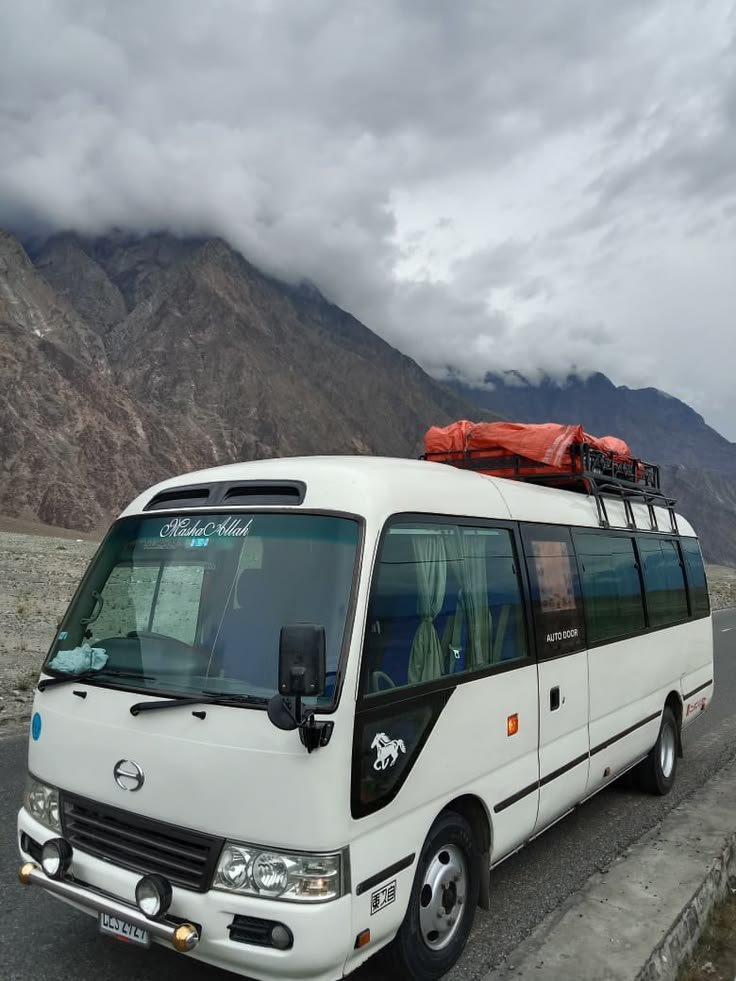 Toyota Coaster 4C Saloon rental Lahore